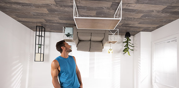 Man looking at an upside down room